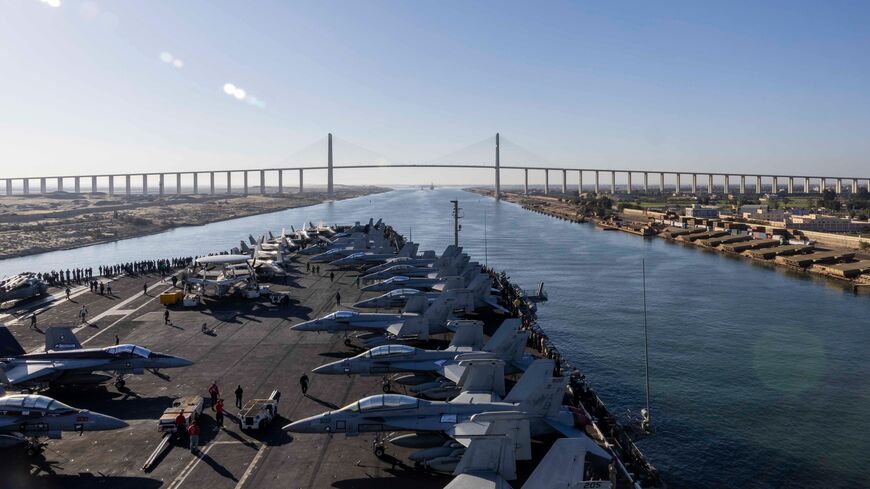 The Nimitz-class aircraft carrier USS Harry S. Truman transits the Suez Canal, on Dec. 15, 2024.