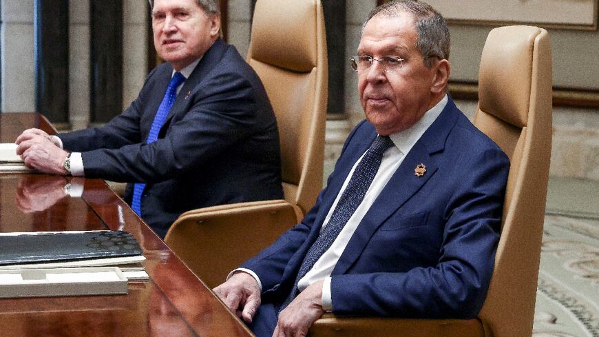 Russia's Foreign Minister Sergei Lavrov with presidential advisor Yuri Ushakov at the start of the Riyadh meeting