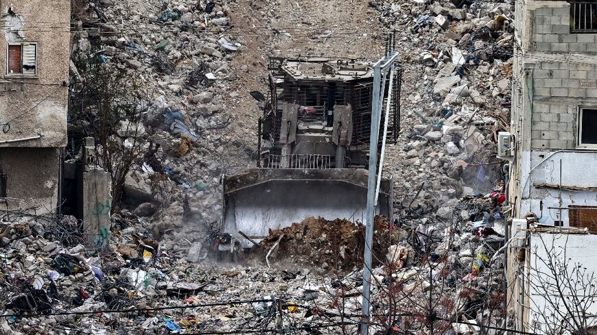 Israeli army bulldozers have wreaked havoc in Tulkarem refugee camp in the occupied West Bank where Israeli Prime Minister Benjamin Netanyahu paid a rare visit to troops on Friday.