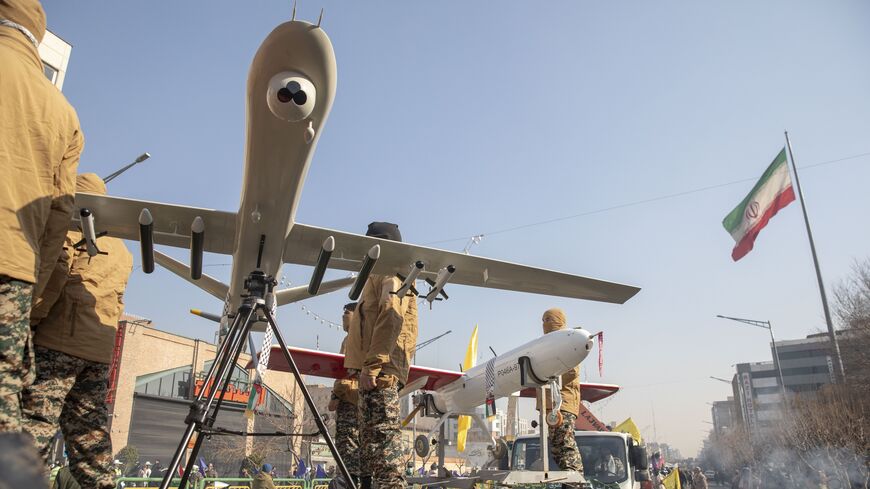  Iranian Basij militia members display their drones during military drills on Jan. 10, 2025, in Tehran, Iran. 