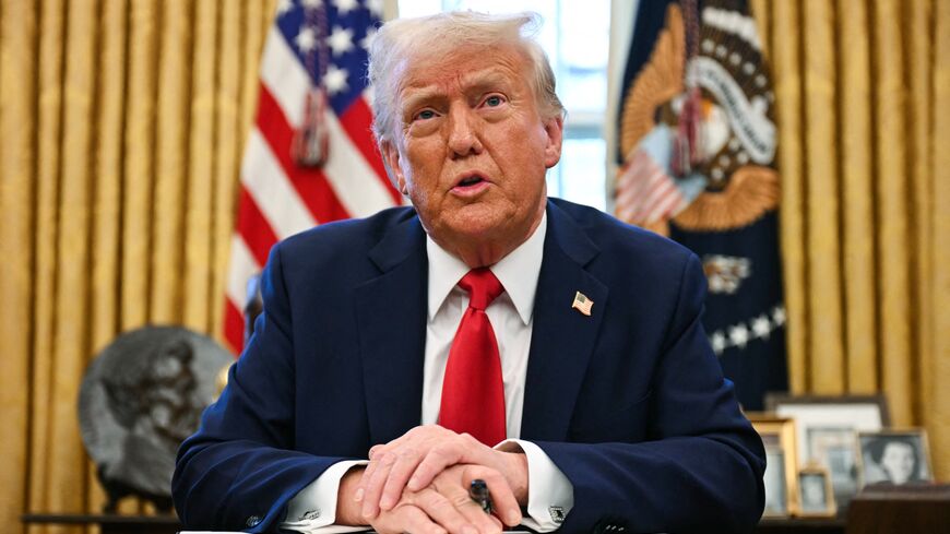 US President Donald Trump speaks to the press as he signs an executive order to create a US sovereign wealth fund in the Oval Office of the White House on Feb. 3, 2025. 