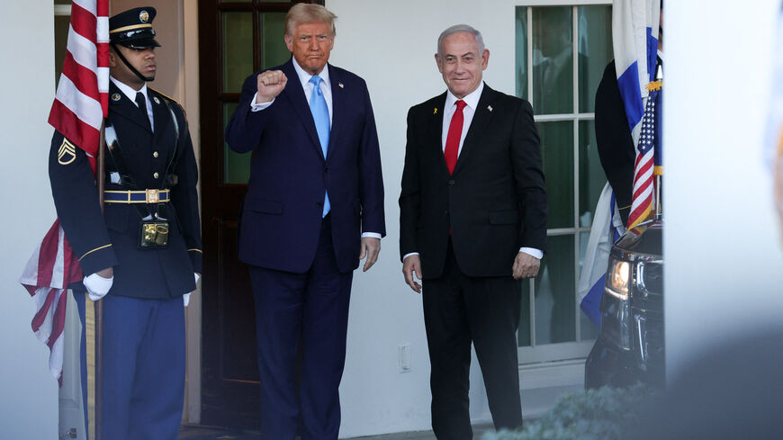 U.S. President Donald Trump greets Israeli Prime Minister Benjamin Netanyahu at the White House in Washington, D.C. on February 4, 2025. (Photo by Bryan Dozier / Middle East Images / Middle East Images via AFP) (Photo by BRYAN DOZIER/Middle East Images/AFP via Getty Images)