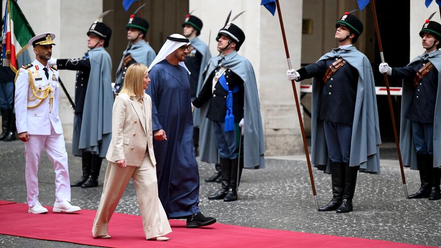 Italy's Prime Minister Giorgia Meloni (C/L) welcomes the President of the United Arab Emirates Sheikh Mohammed bin Zayed Al Nahyan