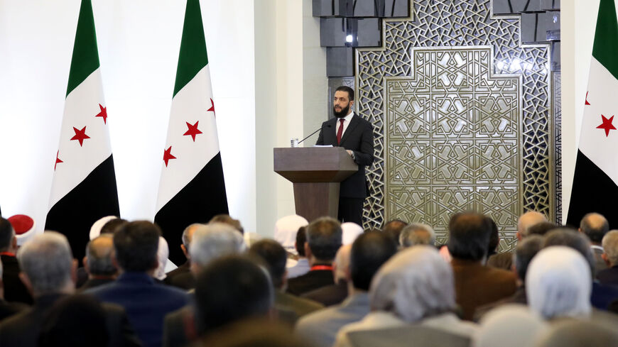 DAMASCUS, SYRIA - FEBRUARY 25: Syrian President Ahmed al-Sharaa holds a speech at the National Dialogue Conference on February 25, 2025 in Damascus, Syria. A national dialogue conference intended to help chart Syria's political future after the fall of former President Bashar Assad began at the Presidential Palace in Damascus on Monday. (Photo by Ali Haj Suleiman/Getty Images)