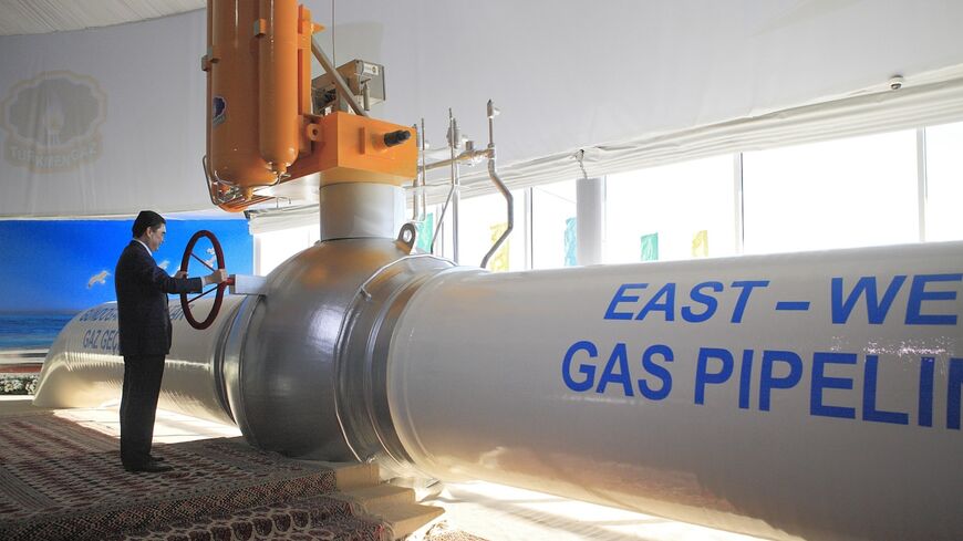 Turkmenistan's President Gurbanguly Berdymukhamedov takes part in the opening ceremony of the East-West pipeline.