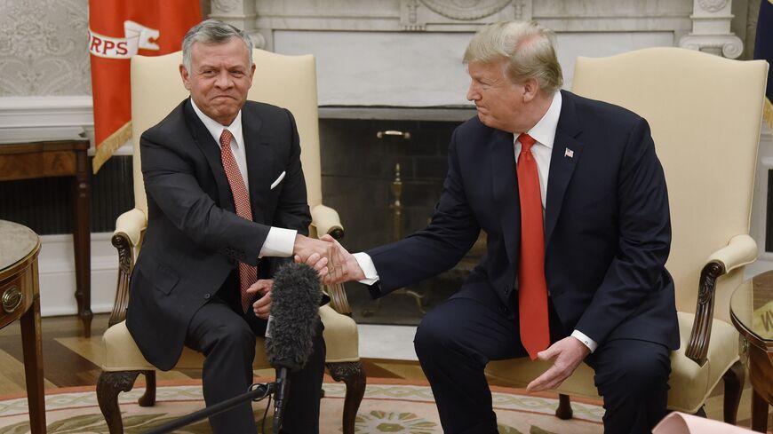 President Donald Trump shakes hands with King Abdullah II during a meeting in the Oval Office of the White House on June 25, 2018 in Washington, DC. 