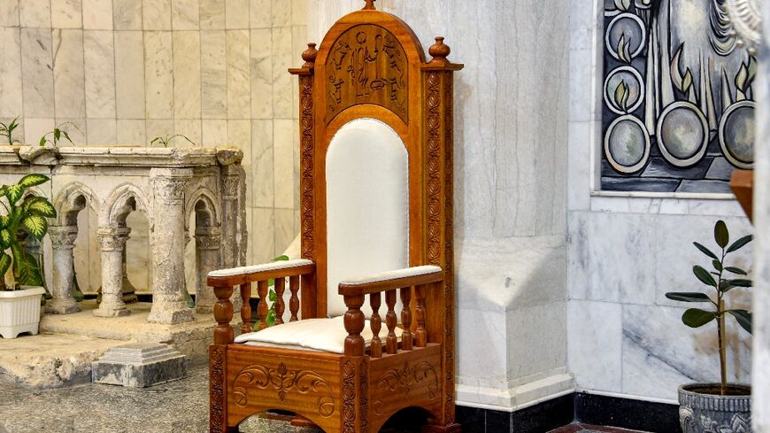 A throne used by Pope Francis during his March 2021 tour of Iraq is pictured at the Syriac Catholic Church of the Immaculate Conception in Iraq's predominantly Christian town of Qaraqosh, Nineveh province