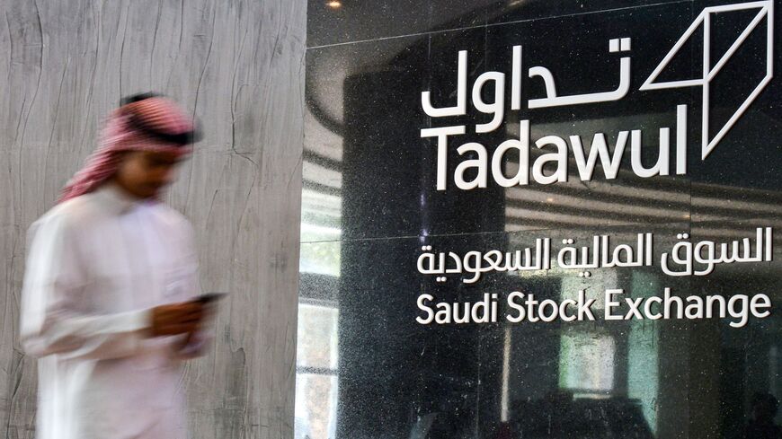 This picture taken Dec. 12, 2019 shows a view of the sign showing the logo of Saudi Arabia's Stock Exchange Market (Tadawul) bourse in the capital Riyadh.