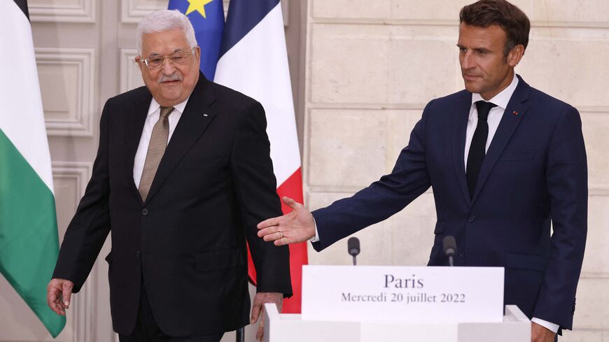 Palestinian President Mahmoud Abbas (L) and French President Emmanuel Macron take part in a joint press conference at the Elysee Presidential Palace in Paris on July 20, 2022. (Photo by Ludovic MARIN / POOL / AFP) (Photo by LUDOVIC MARIN/POOL/AFP via Getty Images)