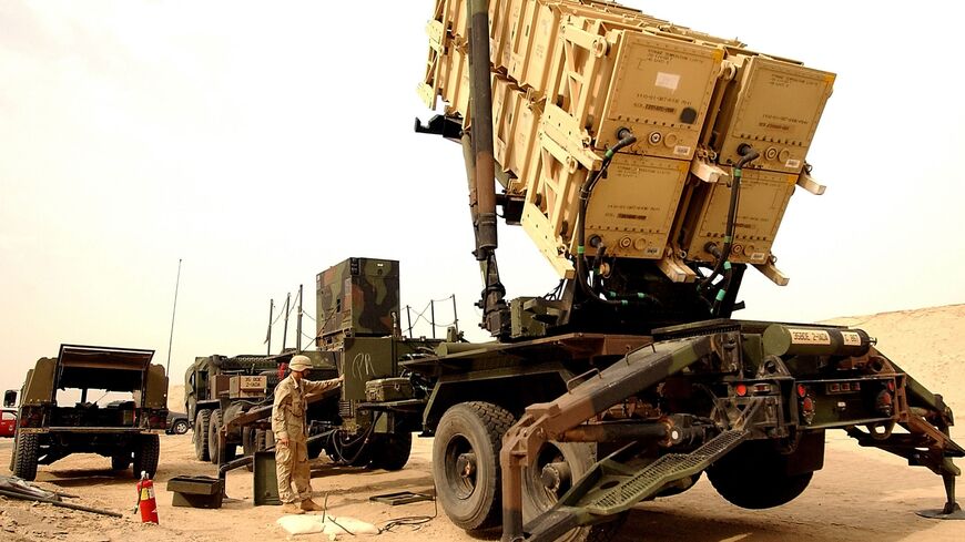 US Army Specialist Brandon Sapikowski checks a Patriot Missile Launch Station, on Feb. 4, 2003, at Camp Arifjan, Kuwait.