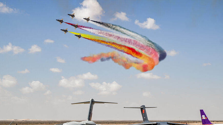 Chengdu J-10 Vigorous Dragon fighter aircraft of China's Ba Yi (August 1st) Aerobatics Team release smoke while performing manoeuvres during the first Egypt International Airshow at Alamein International Airport in Alamein in northern Egypt on September 4, 2024. (Photo by Khaled DESOUKI / AFP) (Photo by KHALED DESOUKI/AFP via Getty Images)