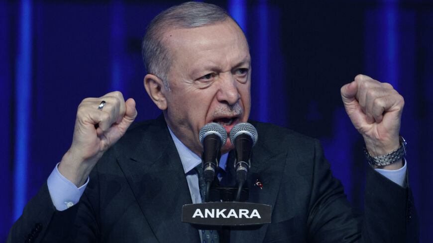 Turkey's President Recep Tayyip Erdogan gestures as he addresses a speech during the Justice and Development Party (AKP), as part of the 8th Ordinary Grand Congress at the Ankara Arena in Ankara, on Feb. 23, 2025. 