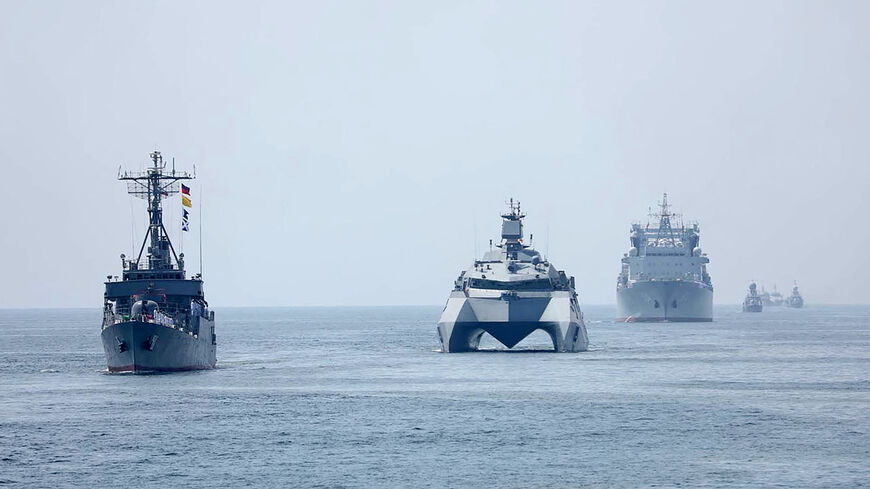 This handout photo made available by the Iranian Army Office on March 12, 2025 shows navy vessels taking part in a joint Iranian-Russian-Chinese military drill in the Gulf of Oman. 