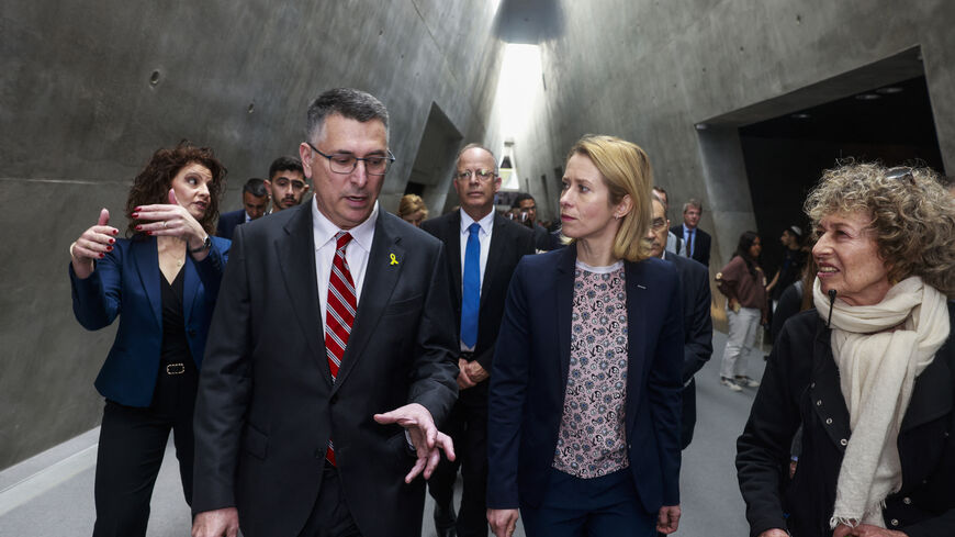 EU foreign policy chief Kaja Kallas (C) listens to Israel's Foreign Minister Gideon Saar (L) during a visit to the Yad Vashem Holocaust Memorial in Jerusalem on March 24, 2025. (Photo by Menahem Kahana / AFP) (Photo by MENAHEM KAHANA/AFP via Getty Images)