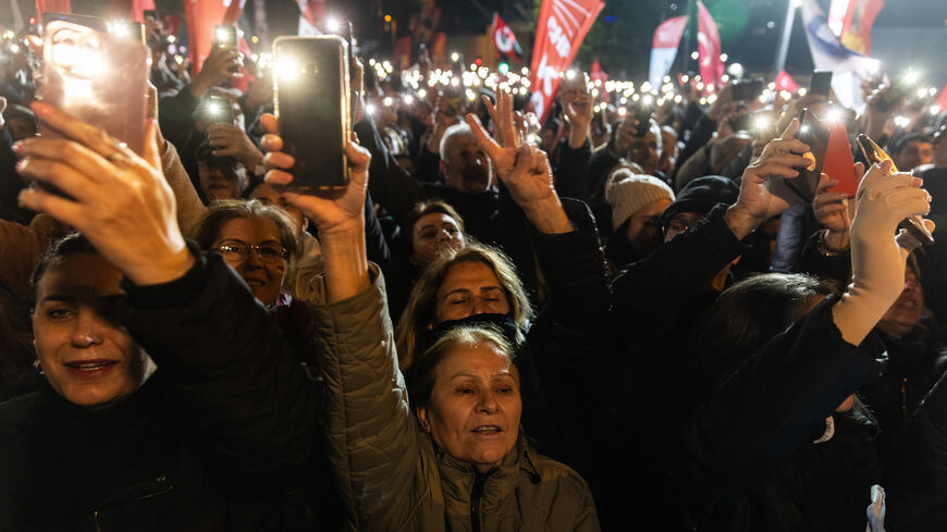 Supporters light up the night with cellphones during a protest rally in support of the arrested Istanbul Mayor Ekrem Imamoglu, Istanbul, Turkey, April 9, 2025.