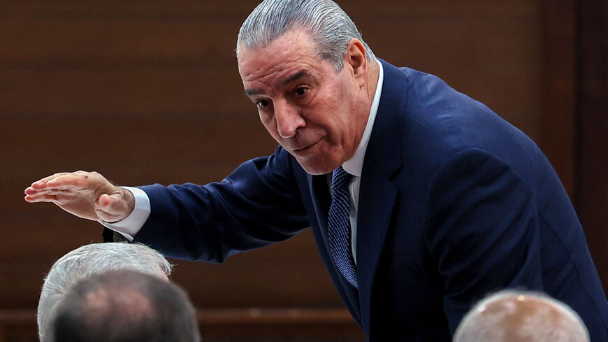 Secretary General of the Executive Committee of the Palestine Liberation Organization (PLO), Hussein al-Sheikh, gestures as he arrives for the 32nd Palestinian Liberation Organization (PLO) Central Council session in Ramallah on April 23, 2025. Palestinian president Mahmud Abbas on April 23 urged Hamas to free all hostages in Gaza, saying their captivity provided Israel with "excuses" to attack the territory, as rescuers recovered charred bodies from an Israeli strike. (Photo by Zain JAAFAR / AFP) (Photo by