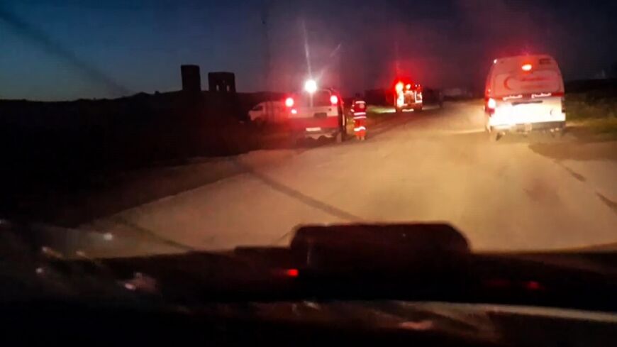 This image grab from a video released by the Palestine Red Crescent Society shows ambulances on the night of the shooting