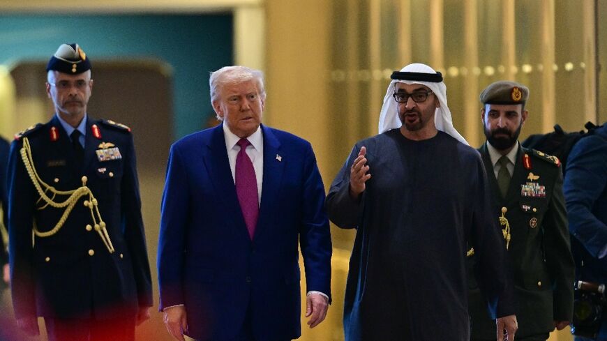 United Arab Emirates President Sheikh Mohamed bin Zayed Al Nahyan (R) welcomes his US counterpart Donald Trump to Abu Dhabi on the third and final leg of a Gulf tour.