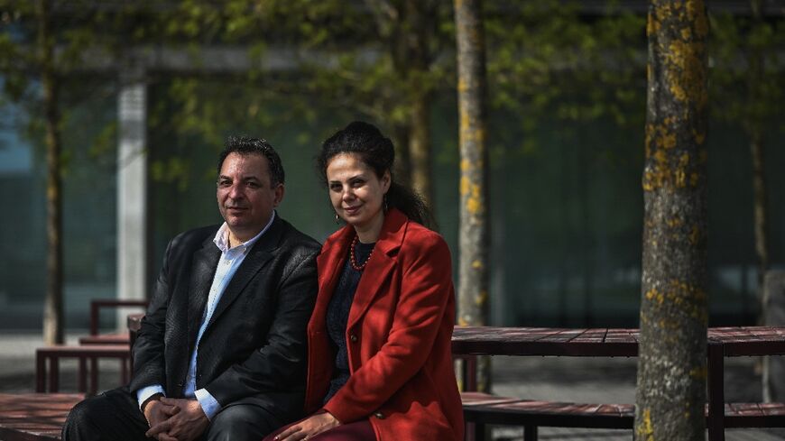 Mazen Darwish,lawyer and founder of the Syrian Center for Media and Freedom of Expression, with his wife Yara Bader