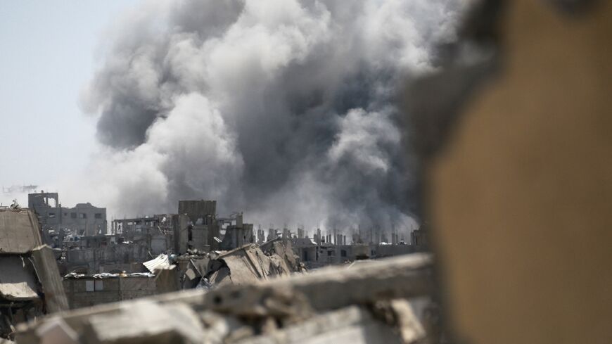 Smoke rises from the site of an Israeli strike in the northern Gaza Strip