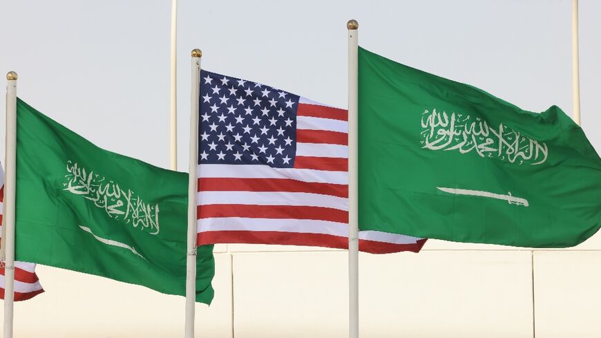 Saudi and US flags line a main road in the Saudi capital Riyadh ahead of President Trump's visit
