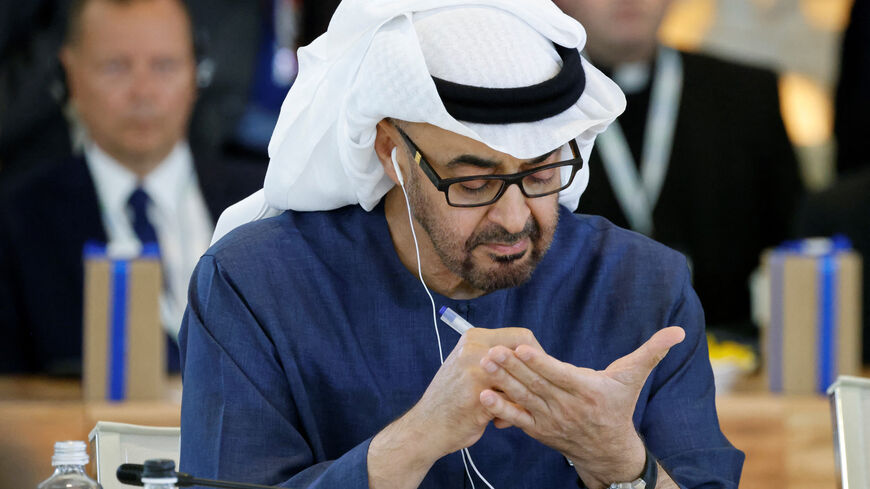 United Arab Emirates' President Sheikh Mohamed bin Zayed Al Nahyan takes notes as he attends a working session on Artificial Intelligence (AI), Energy, Africa-Mediterranean at the Borgo Egnazia resort during the G7 Summit in Savelletri near Bari, Italy, on June 14, 2024. (Photo by Ludovic MARIN / AFP) (Photo by LUDOVIC MARIN/AFP via Getty Images)
