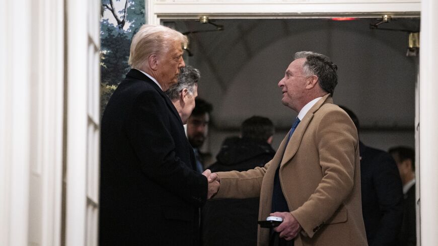 President Donald Trump shakes hands with Steve Witkoff, special envoy to the Middle East at the White House on Feb. 11, 2025.