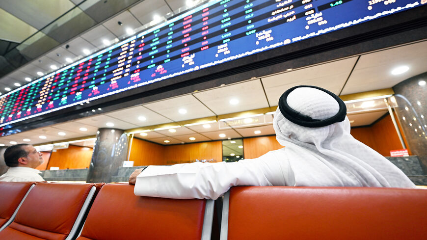 TOPSHOT - Kuwaiti traders follow the stock market activity at Boursa Kuwait, in Kuwait City on April 7, 2025. According to official news agencies, Kuwait's primary index fell 5.7 percent, the Qatari stock exchange was down 4.2 percent, and in Oman, the Muscat stock market closed with a 2.6-percent decline. Under Trump's policy, goods from Saudi Arabia, Kuwait, Qatar, Oman and the United Arab Emirates will be subject to a 10-percent "baseline" tariff. The uncertainty over trade and manufacturing has helped t