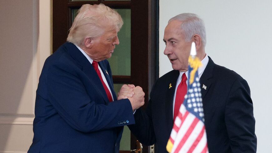 US President Donald Trump (L) bids farewell to Israeli Prime Minister Benjamin Netanyahu as he leaves the White House after a meeting on April 7, 2025, in Washington.