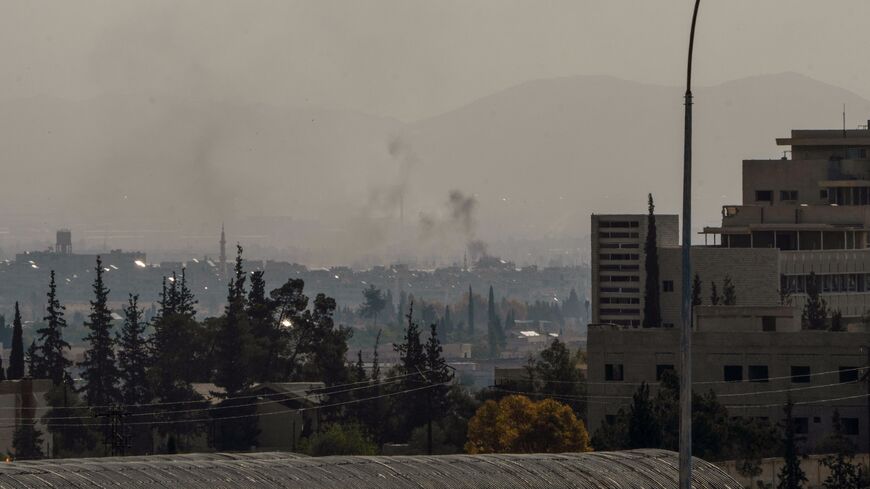 Smoke billows near a military hospital in Harasta, northeast Damascus, following Israeli airstrikes across Syria overnight on May 3, 2025.