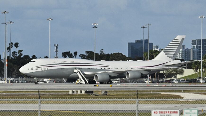 A Qatari Boeing 747 sits on the tarmac of Palm Beach International airport after US President Donald Trump toured the aircraft on Feb. 15, 2025.