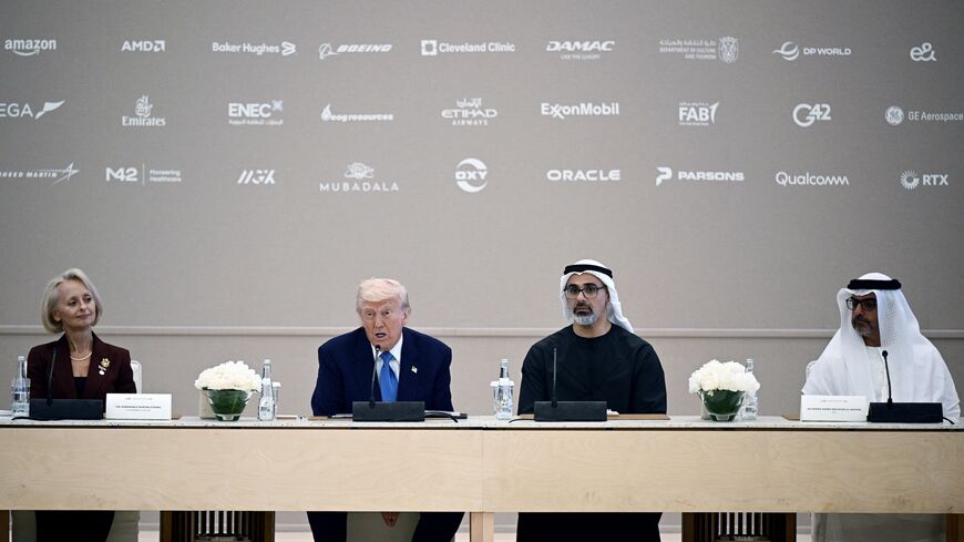 US President Donald Trump and Abu Dhabi Crown Prince Sheikh Khaled bin Mohamed bin Zayed Al Nahyan (2nd R) attend a business forum in Abu Dhabi, May 16, 2025.