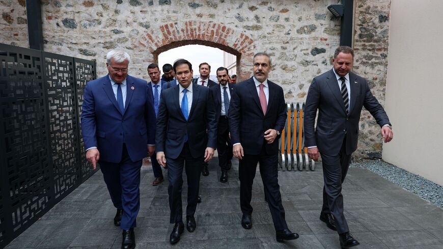Turkish Foreign Minister Hakan Fidan (2R), US Secretary of State Marco Rubio (2L) and Head of the Office of the President of Ukraine Andrii Yermak (R) attend the Turkiye-US-Ukraine Trilateral meeting as Ukrainian, American and Russian delegates meet for peace talks at the office of Turkish President in Dolmabahce Palace on May 16, 2025 in Istanbul, Turkey.