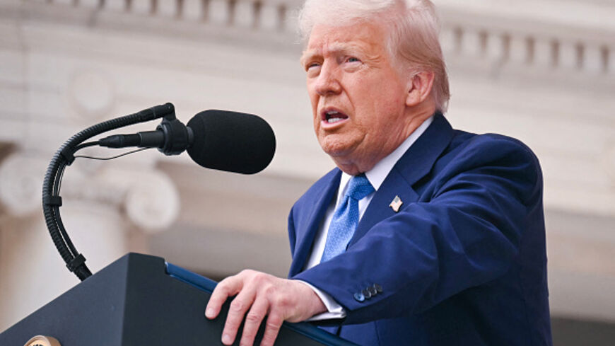 US President Donald Trump delivers remarks at the Memorial Amphitheatre in Arlington National Cemetery in Arlington, Virginia, on May 26, 2025. (SAUL LOEB/AFP via Getty Images)