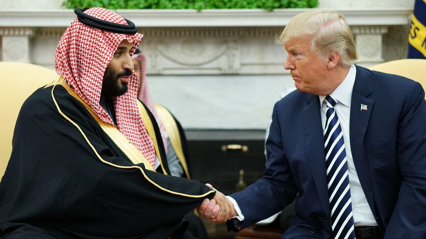 President Donald Trump shakes hands with Saudi Arabia's crown prince, Mohammed bin Salman, in the Oval Office of the White House on March 20, 2018.