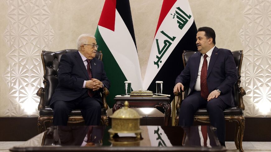 Iraqi Prime Minister Mohammed Shia al-Sudani (R) hold talks with Palestinian president Mahmud Abbas ahead of Saturday's Arab League meeting in Baghdad.