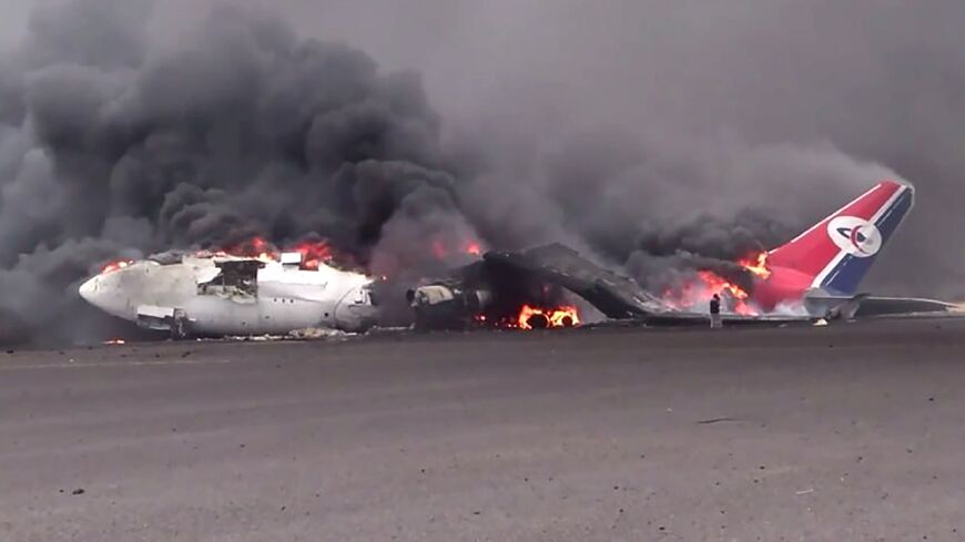 This picture released by Huthi media shows an airliner on fire in Yemen's rebel-held capital Sanaa following an Israeli strike on the airport Tuesday.