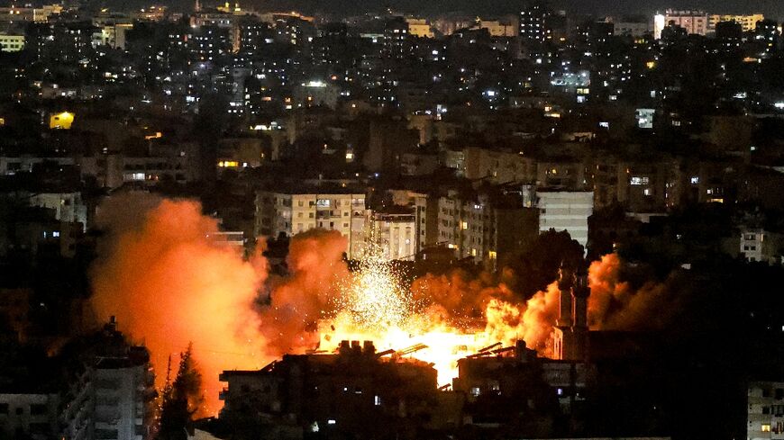 Smoke and fire erupted from the site of one of the strikes in southern Beirut