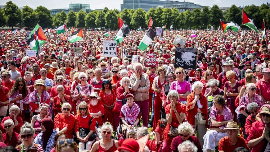 

Rights groups such as Amnesty International and Oxfam organised the demonstration through the city to the International Court of Justice, creating a so-called 'red line'