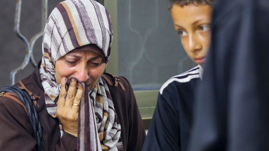 Mourned at the morgue of a central Gaza hospital, where victims of a shooting incident near an aid centre were taken