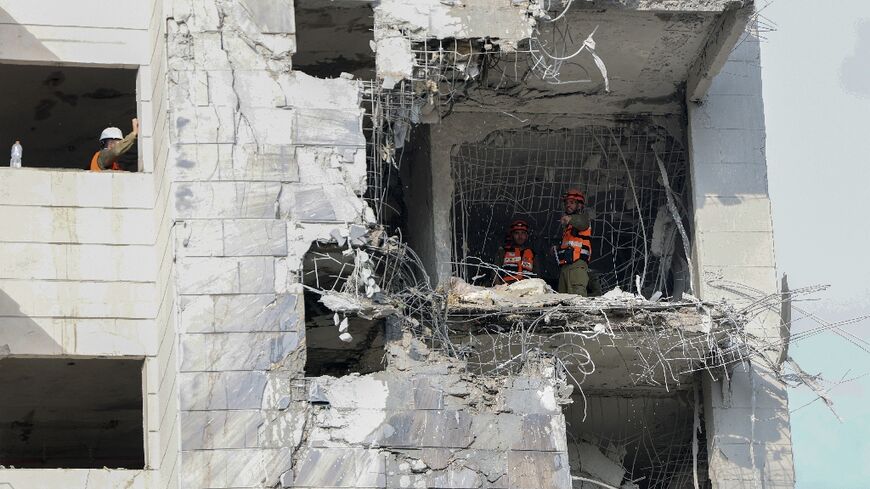 Iran unleashed a missile barrage on Israeli cities Monday after Israel hit deep inside the Islamic republic