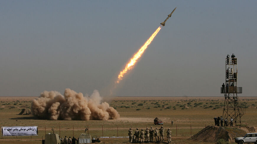 Iranian short-range missile (Tondar) is test-launched during war games in Qom, 120 kms south of Tehran, on September 27, 2009. Iran test-fired three short-range missiles as the Islamic republic began war games at a time of heightened tension with the West over its controversial nuclear programme. AFP PHOTO/SHAIEGAN/FARS NEWS (Photo by SHAIGAN / FARS NEWS / AFP) (Photo by SHAIGAN/FARS NEWS/AFP via Getty Images)