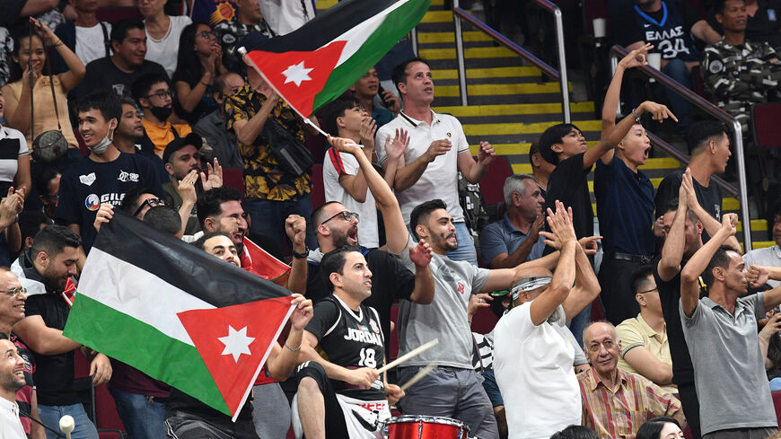 Jordanian fans cheer for their team during the FIBA Basketball World Cup group C match between Jordan and New Zealand at the Mall of Asia Arena in Pasay City, suburban Manila on August 28, 2023. (Photo by Ted ALJIBE / AFP) (Photo by TED ALJIBE/AFP via Getty Images)