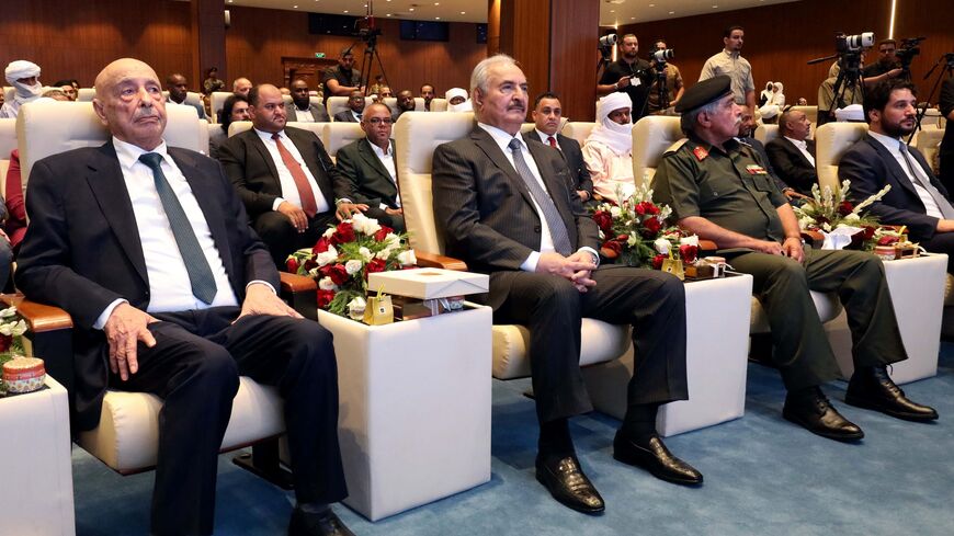 Libyan military strongman Khalifa Hifter (2nd L)