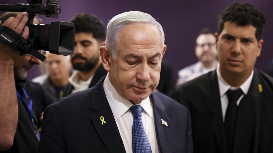 Israeli Prime Minister Benjamin Netanyahu attends his trial on corruption charges at the District Court in Tel Aviv, on Dec. 16, 2024.