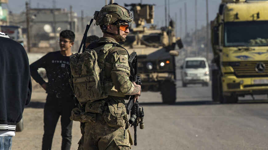 A US soldier keeps watch during a patrol in Syria's northeastern city Qamishli, in the Hasakeh province, mostly controlled by Kurdish-led Syrian Democratic Forces (SDF), on Jan. 9, 2025.