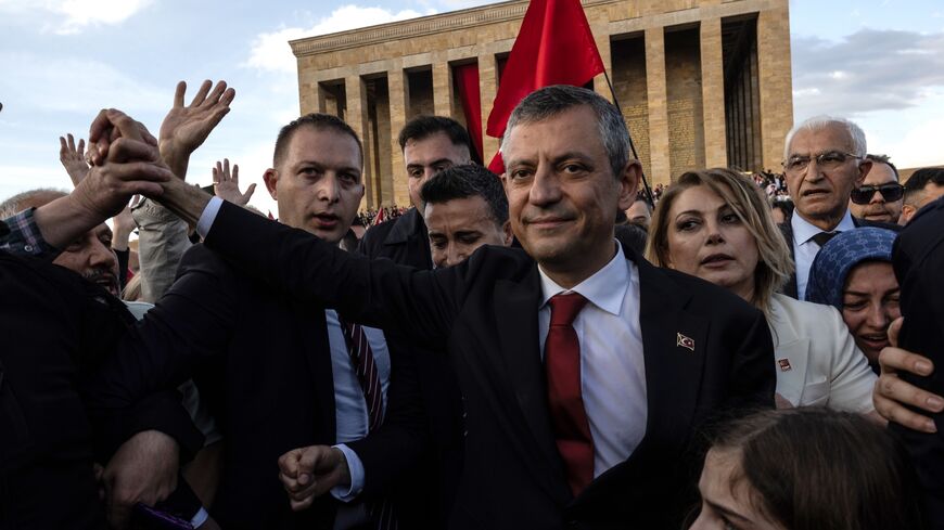 Ozgur Ozel, head of Turkey's main opposition Republican People's Party (CHP), gestures toward supporters during a rally in support of arrested Istanbul Mayor Ekrem Imamoglu in Ankara, April 23, 2025.