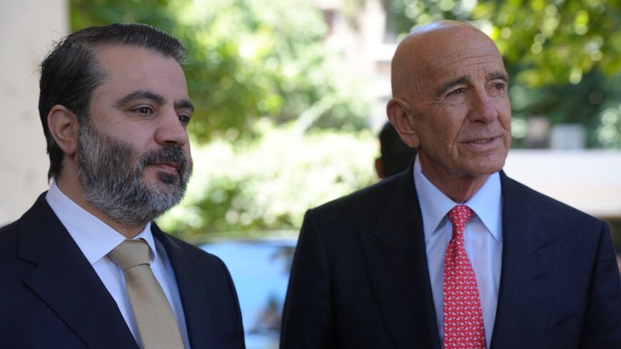 Syria's Foreign Minister Asaad al-Shaibani and US special envoy for Syria Ambassador to Turkey Thomas Barrack (R).