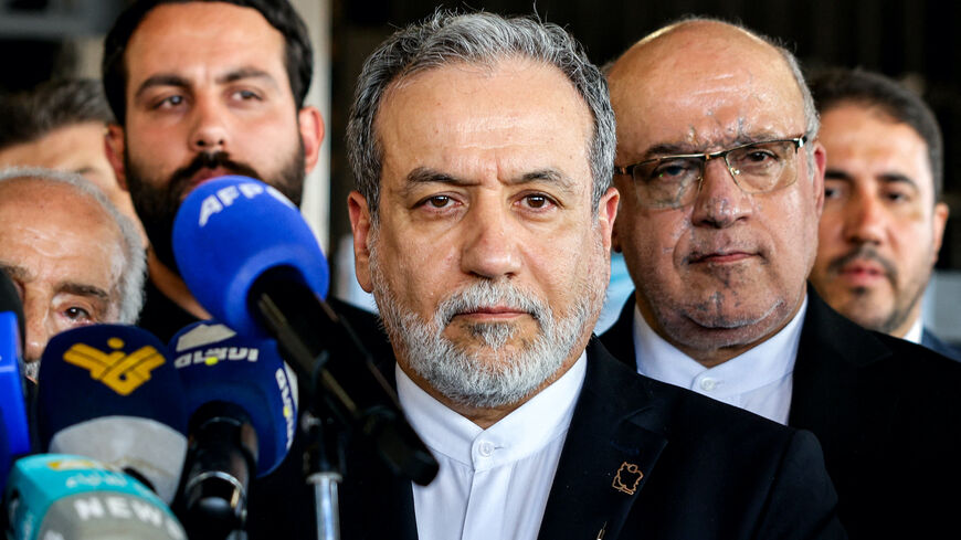 Iran's Foreign Minister Abbas Araghchi (C) gives a statement during his visit to the mausoleum of slain Lebanese Hezbollah's Leader Hassan Nasrallah, who was killed in an Israeli air strike in September 2024, in Beirut's southern suburbs on June 3, 2025. 