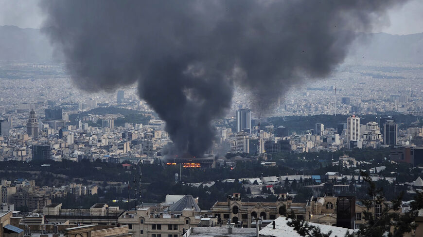 Smoke rises after a reported Israeli strike on a building used by Islamic Republic of Iran News Network, part of Iran's state TV broadcaster, Tehran, Iran, June 16, 2025.